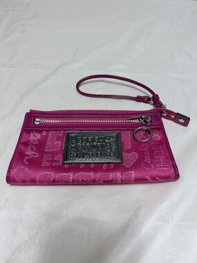Coach Pink wristlet  Signature Zip wallet ($98)